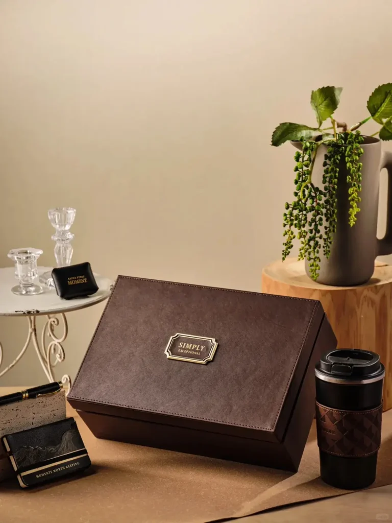 Leather-inspired luxury gift set with thermal flask, signature pen, leather notebook, car fragrance diffuser, and leather storage tray