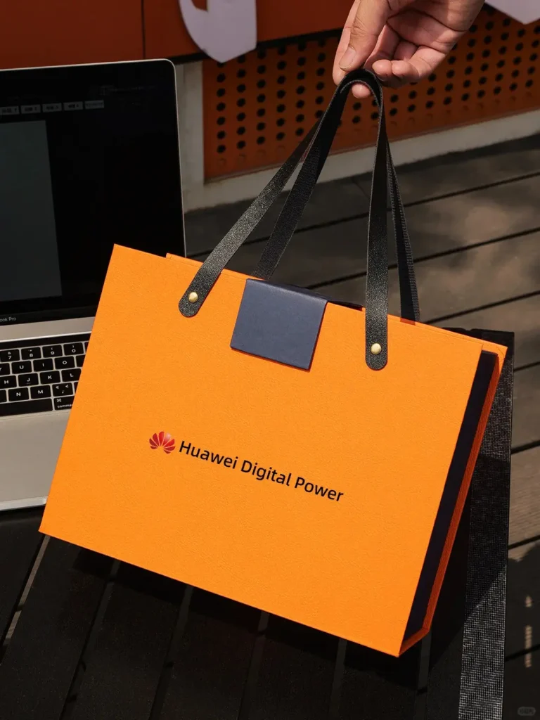 Closed view of Huawei orange custom gift box, ideal for corporate gifts, custom logo gifts, and luxury packaging