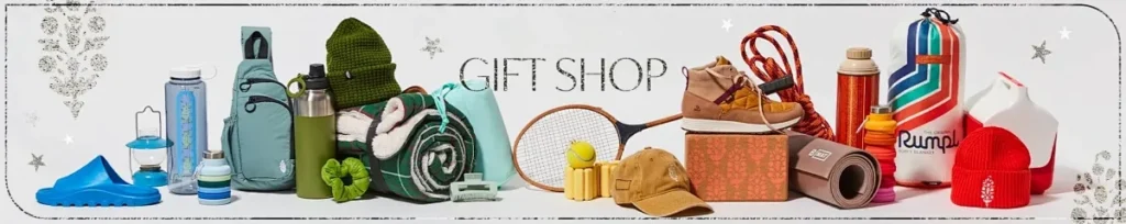 Collection of branded outdoor gifts including bottles, bags, and accessories