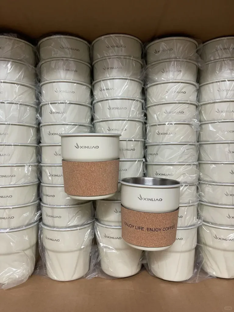 Ivory white stainless steel coffee cup in a gift box, ideal for trade show giveaways and one of the best trade show giveaways to impress visitors.