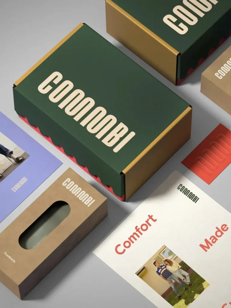 Green and magenta custom gift boxes paired with natural kraft paper, showcasing creative color contrast and modern custom gift wrap design.