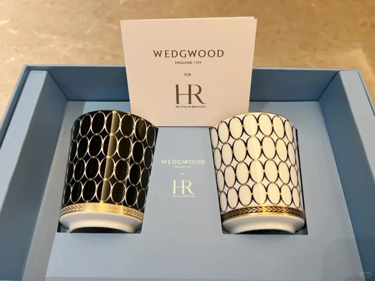 Helena Rubinstein promotional giveaway mugs in black and white with brand design elements