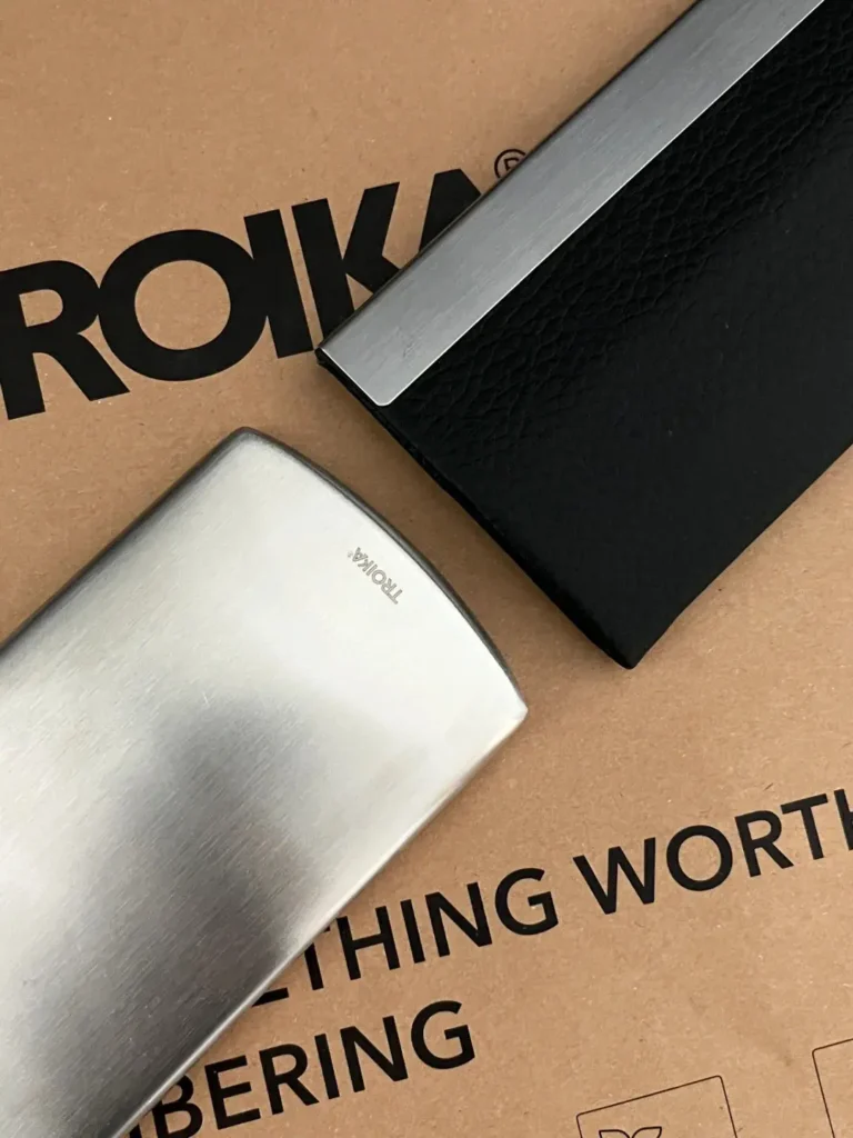 Premium business card holder displayed on desk, back can be engraved with custom logo, ideal trade show gift