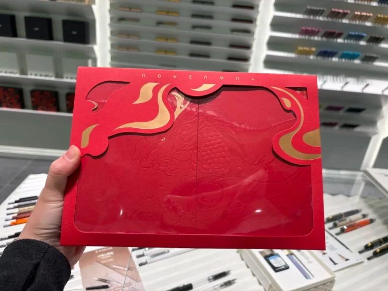 Red pen gift box prepared for employees, a thoughtful example of good employee gifts