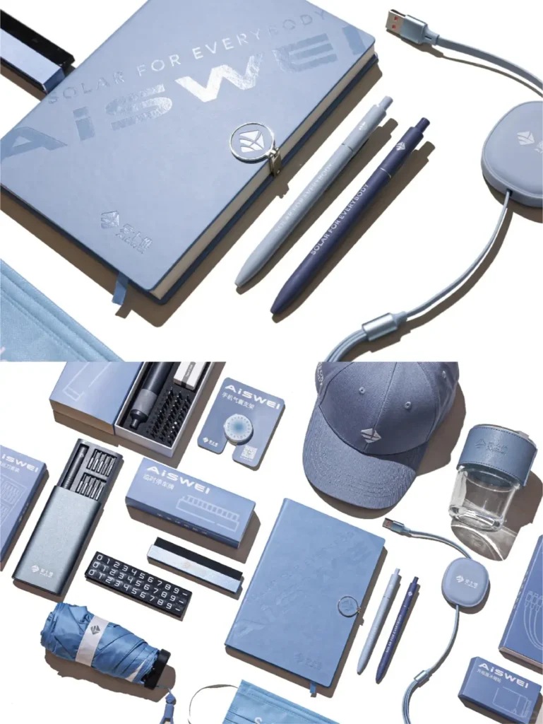 Blue themed company swag set including branded umbrella, foldable fan, phone grip, canvas bag, cap, power bank and backpack