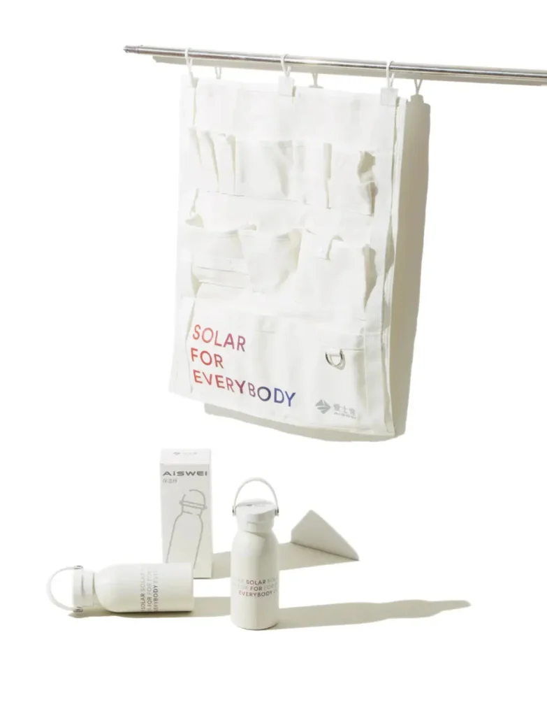 Branded company swag items including a canvas wall hanging organizer and a carry handle water bottle with logo