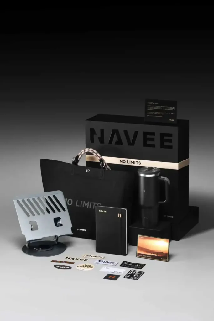 Bespoke Corporate Gifts That Make Business Feel More Personal 4 Design illustration of an extended custom gift set featuring a card, gift box, tote bag, notebook, and water cup, ideal for corporate gifts and promotional events.