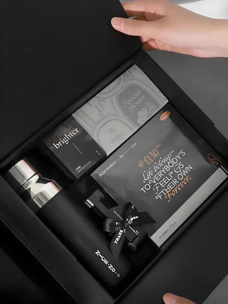 Bespoke Corporate Gifts That Make Business Feel More Personal 2 Opened customized gift box displaying a thermos and personalized card, ideal for corporate gifting and employee appreciation.