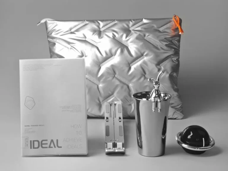 Design illustration of a private label gifts set including a water cup, laptop stand, and pillow, perfect for branding and personalized gifting solutions.
